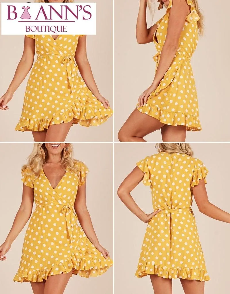 POLLY’S PERFECT POLKA DOT WRAP DRESS